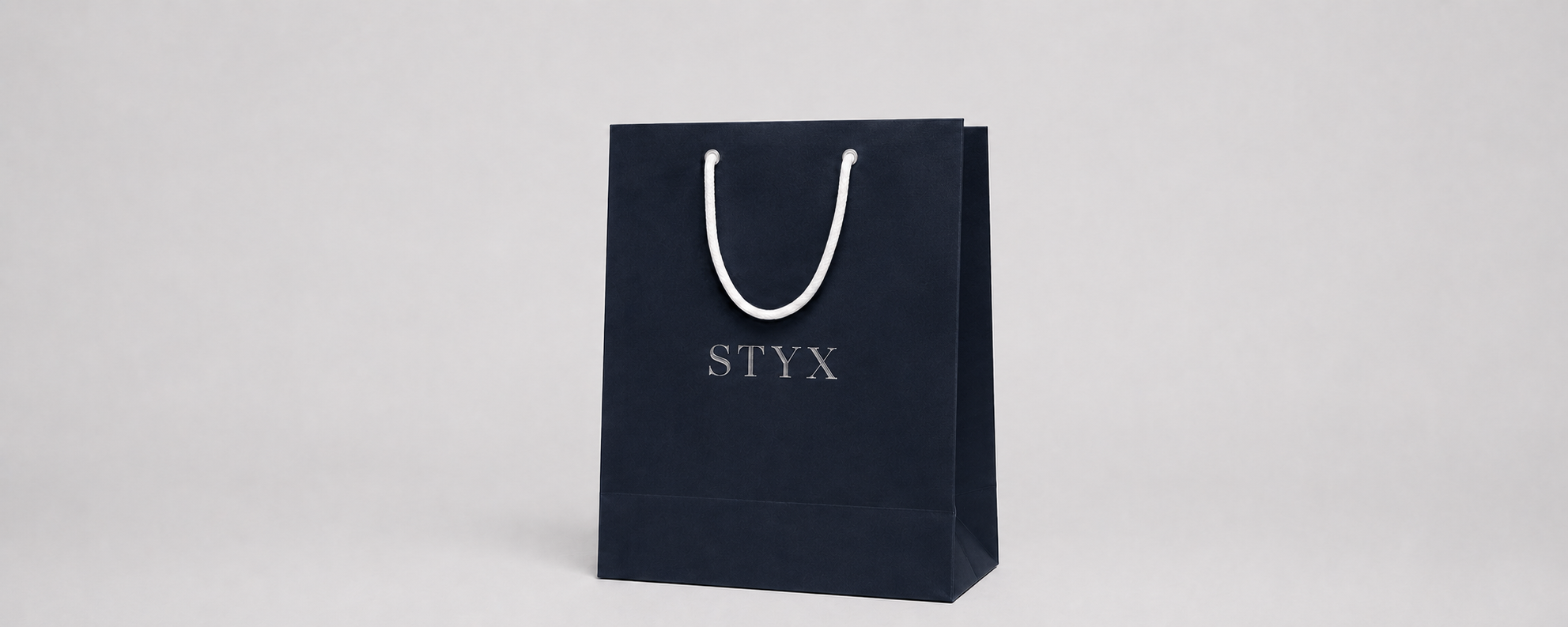 Premium Styx navy bag with silver foil and cotton rope handles